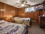 Lower Level Bedroom with Two Twin Beds & Flat Screen TV